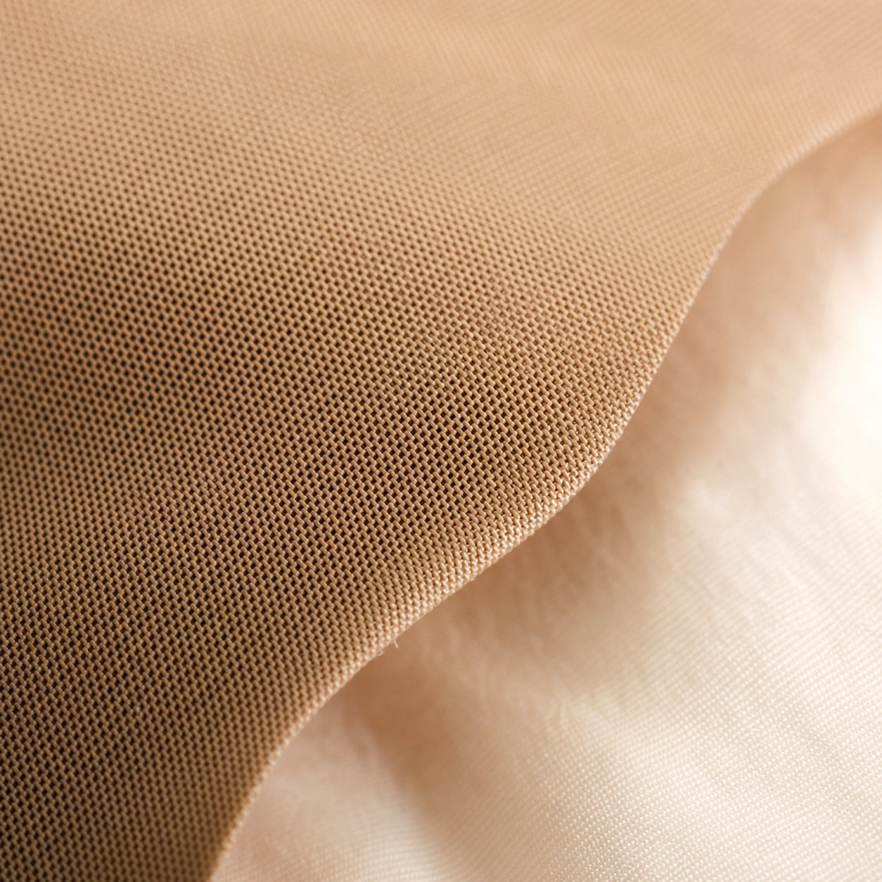Macro of powernet shapewear fabric with bonded edge
