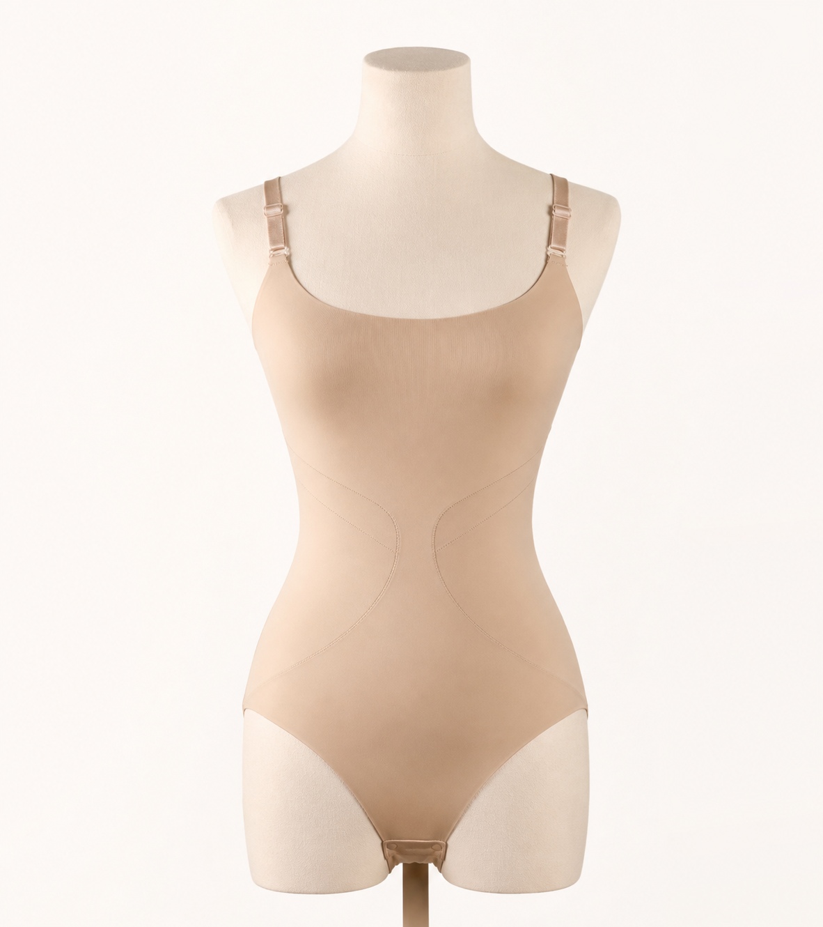 Shaping bodysuit with adjustable straps on dress form